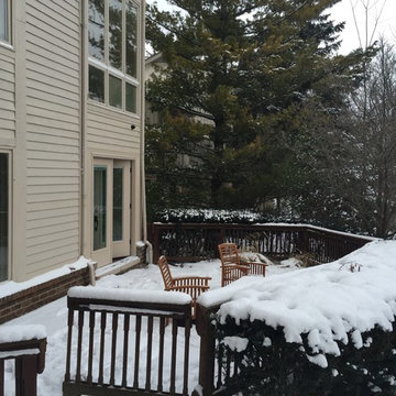 Outdoor Kitchen with  fireplace, dining area and seating wall
