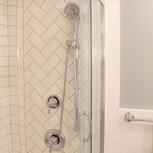 Inspiration for a mid-sized timeless master white tile and subway tile marble floor bathroom remodel in Burlington with dark wood cabinets, a two-piece toilet, gray walls, an undermount sink and marble countertops