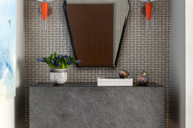 Mid-sized tuscan dark wood floor powder room photo in Boston with beige walls