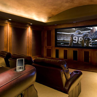Photo of a large classic enclosed home cinema in Portland with carpet.