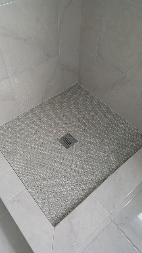 Penny Tile Looks Askew, Black And White Penny Tile Shower Floor