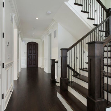 Classic Mission Style Dark Stained Wooden Staircase with Iron Balusters