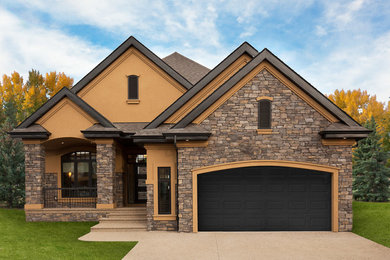 Example of a trendy stucco exterior home design in Edmonton