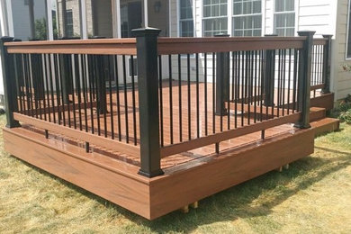 Patio - mid-sized traditional backyard patio idea in Other