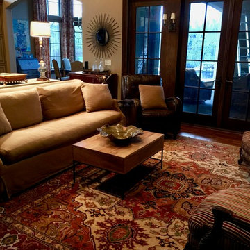 Old World Serapi with detailed geometry brings depth to this Family Room