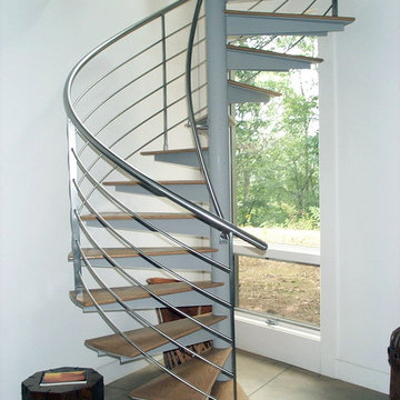 Stunning Spiral Stair with Stainless Steel Multiline Rail and Oak Treads