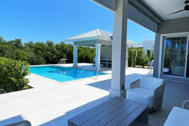 Example of a minimalist patio design in Other