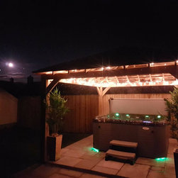 Pinnacle ES under a pergola - Hot Tubs
