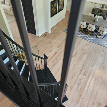 Project #130 | Curved Staircase with Wraparound Balcony