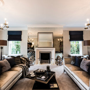 Idéer för stora funkis vardagsrum, med ett finrum, heltäckningsmatta, en standard öppen spis, en spiselkrans i metall och beige väggar