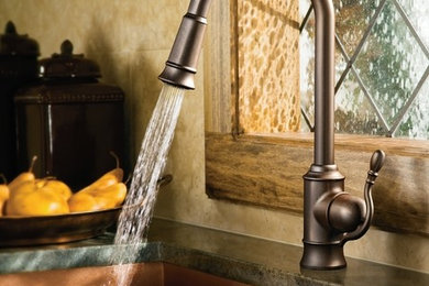 Moen Woodmere Classic stainless one-handle high arc pulldown kitchen faucet