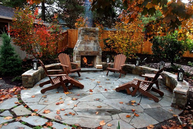 Inspiration for a traditional patio in Portland with a fire feature.