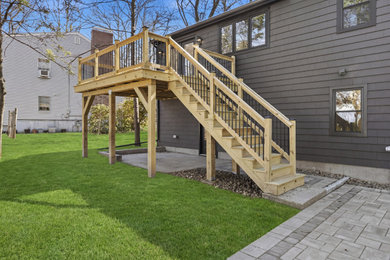 Example of an arts and crafts deck design in Boston