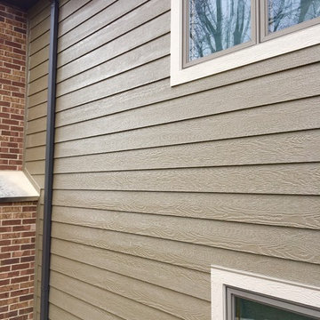 Diamond Kote siding, aluminum Dark bronze soffit and gutters