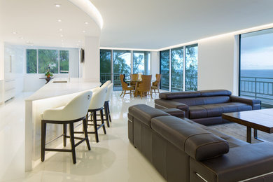 Mid-sized trendy formal and open concept beige floor living room photo in New York with beige walls and no fireplace