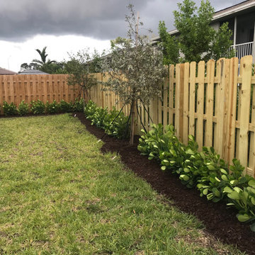 Wood fence & hedge installation