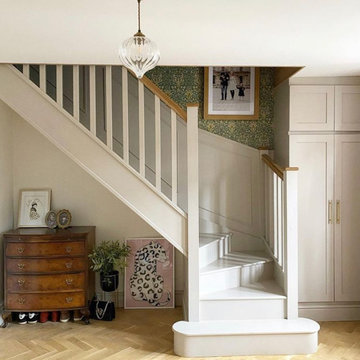 Painted square spindles with oak handrail