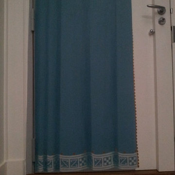 Faux drapé sur porte blindée