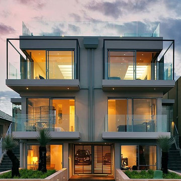 Contemporary Beachside Duplex with Framed Glass Balconies