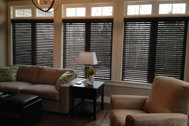 Inspiration for a mid-sized craftsman medium tone wood floor sunroom remodel in Other with a standard ceiling