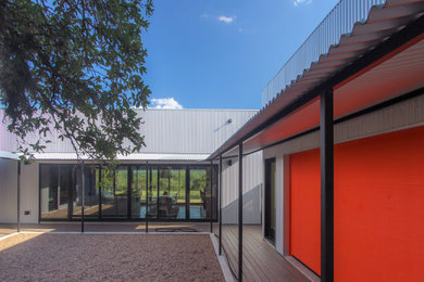 Example of an asian home design design in Austin