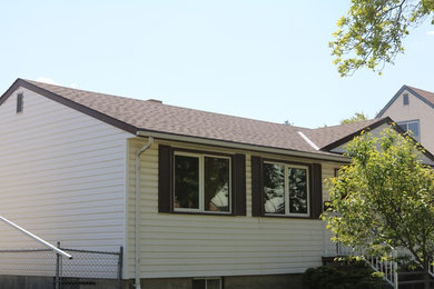 Example of an exterior home design in Edmonton