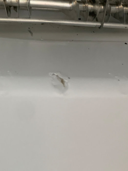 Puncture in freezer wall, is it dangerous?