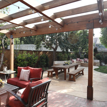 Wooden trellis, stone and brick patio