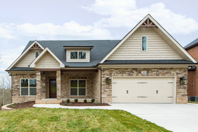 Arts and crafts brown exterior home photo in Other with a shingle roof