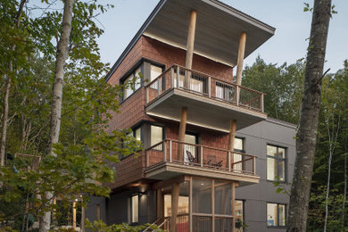 Example of a mountain style exterior home design in Portland Maine