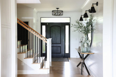 Example of a transitional entryway design in Other