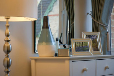Design ideas for a medium sized modern bedroom in Dorset.