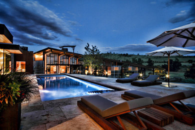 Hot tub - large modern backyard tile and rectangular lap hot tub idea in Denver