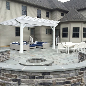 Warren, NJ Beautiful transformation - Blue stone patio with pergola and fire pit
