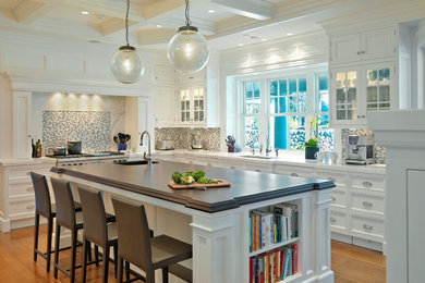 Inspiration for a timeless kitchen remodel in Boston with recessed-panel cabinets, white cabinets and multicolored backsplash