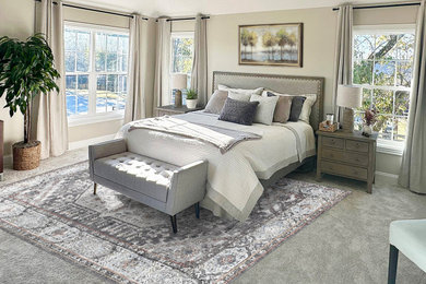Bedroom - mid-sized contemporary master carpeted and beige floor bedroom idea in Nashville with beige walls