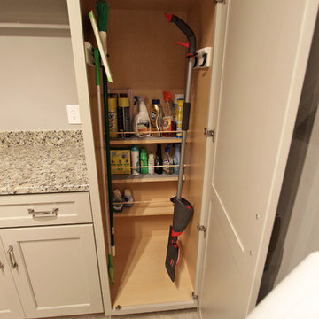 Laundry Room w/ Chai Latte Classic Paint Cabinets and Giallo Traversella Granite