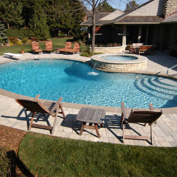 Northbrook, IL Freeform Pool with Round Elevated Hot Tub