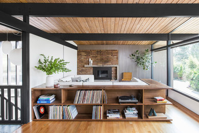Photo of a midcentury family room in Seattle.