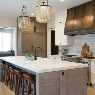 The Timeless Kitchen: Warm Ceramic Textures and Bronze Accents