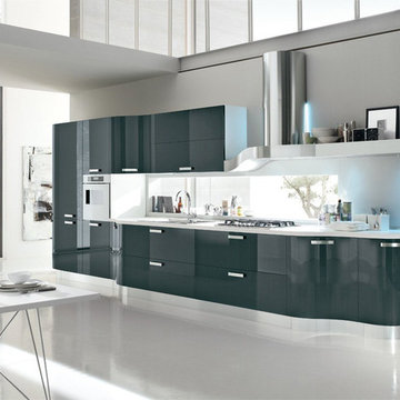 Modern dark green kitchen with rounded cabinets