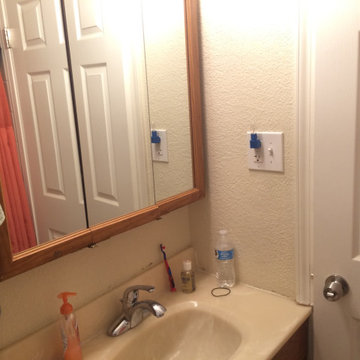 BEFORE PIC - VERY SMALL VANITY BARELY FITS THE SPACE!
