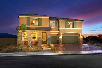Example of a trendy brown two-story stucco exterior home design in Denver