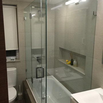 Custom corner tub shower enclosure