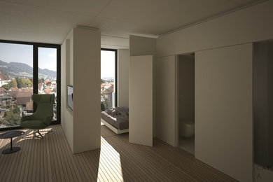 Kleines Modernes Hauptschlafzimmer mit beiger Wandfarbe, braunem Holzboden und braunem Boden in Sonstige