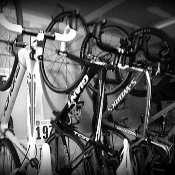 Before: bikes hanging by hooks from the ceiling.