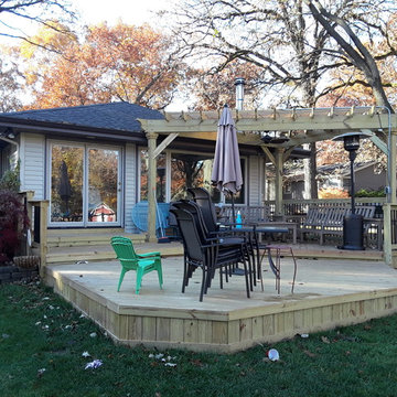 Multi-level Wood Deck with Pergola by Deck and Pergola Builder.