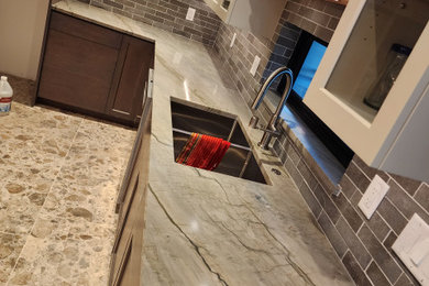 Inspiration for a mid-sized l-shaped eat-in kitchen remodel in Seattle with an island