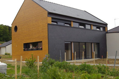 Cette photo montre une façade de maison tendance.