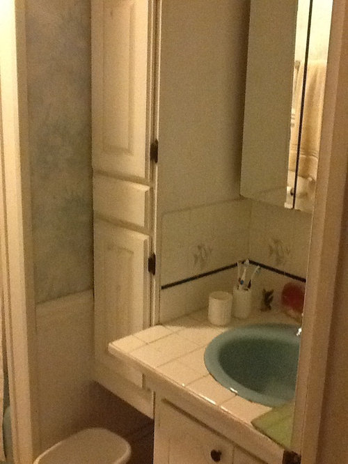 Very small bathroom in 100 yr old house.